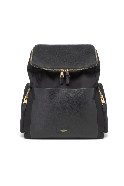 Black nappy bag backpack with gold zippers on a white background